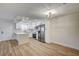 Bright kitchen featuring white cabinets, stainless steel appliances, and an island at 2725 S Nellis Blvd # 2036, Las Vegas, NV 89121