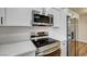 Close-up of the kitchen featuring stainless steel appliances and light countertops at 2725 S Nellis Blvd # 2036, Las Vegas, NV 89121