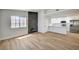 Open-concept living room seamlessly connects to a modern kitchen with stainless appliances at 2725 S Nellis Blvd # 2036, Las Vegas, NV 89121