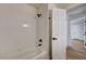 Clean bathroom with tiled shower and modern fixtures, adjacent to the bright hallway at 2725 S Nellis Blvd # 2036, Las Vegas, NV 89121
