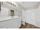 Bathroom features a white vanity, shower over tub, and modern fixtures at 2834 Crystal Lantern Dr, Henderson, NV 89074