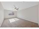 Bright bedroom with neutral carpet and ample natural light at 2834 Crystal Lantern Dr, Henderson, NV 89074