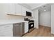 Kitchen area features modern stainless steel appliances and quartz countertops at 2834 Crystal Lantern Dr, Henderson, NV 89074