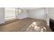 Bright living room with wood flooring, fireplace, staircase, and ample natural light at 2834 Crystal Lantern Dr, Henderson, NV 89074