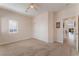 Simple bedroom with carpeted floors, closet space, and ample natural light at 329 Gemstone Hill Ave, North Las Vegas, NV 89031