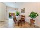 Inviting dining room with sliding glass doors that lead to a beautiful backyard at 329 Gemstone Hill Ave, North Las Vegas, NV 89031