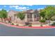 Charming single-story home with a well-maintained front yard and red sidewalk border at 329 Gemstone Hill Ave, North Las Vegas, NV 89031