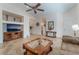 Open-concept living room featuring stylish decor, neutral tones, and ample natural light at 329 Gemstone Hill Ave, North Las Vegas, NV 89031