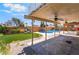 View of outdoor seating and pool in the backyard at 4356 Sabadell St, Las Vegas, NV 89121