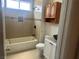 Bathroom with a large bathtub, cabinet and unique vessel sink at 4356 Sabadell St, Las Vegas, NV 89121