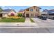 Two-story house with a two-car driveway and solar panels on the roof at 4356 Sabadell St, Las Vegas, NV 89121