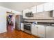 Kitchen with stainless steel appliances and white cabinetry at 4356 Sabadell St, Las Vegas, NV 89121