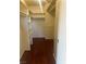Well-organized walk-in closet with shelving, rod, and wood floor, offering ample storage space at 4356 Sabadell St, Las Vegas, NV 89121