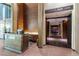 Elegant hotel lobby with a modern bell desk and stylish wood accents creating a welcoming atmosphere at 4381 W Flamingo Rd # 18320, Las Vegas, NV 89103