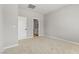 Neutral bedroom featuring plush carpeting and an ensuite bathroom at 4417 Pioche Ave, North Las Vegas, NV 89032