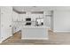 Contemporary kitchen featuring white cabinets, stainless steel appliances, and a center island at 4417 Pioche Ave, North Las Vegas, NV 89032