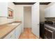 Functional laundry room featuring modern washer and dryer, and ample storage at 4649 Bird View Ct, Las Vegas, NV 89129