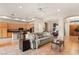 Spacious living room showcasing tile floors, an open floor plan, and access to the kitchen at 4649 Bird View Ct, Las Vegas, NV 89129