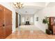 Inviting living room showcasing a fireplace, lots of natural light, and easy access to the entry way at 4649 Bird View Ct, Las Vegas, NV 89129