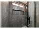 Modern bathroom with stylish tile, sleek fixtures, and a glass-enclosed shower for a spa-like experience at 4669 Winfield Dr, Las Vegas, NV 89147