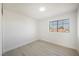 Inviting bedroom featuring wood-style floors and a window providing ample light at 4669 Winfield Dr, Las Vegas, NV 89147