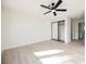 Minimalist bedroom with a ceiling fan and a closet with sliding doors at 4669 Winfield Dr, Las Vegas, NV 89147
