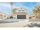 Charming two-story home featuring a two-car garage, desert landscaping, and a tile roof at 4669 Winfield Dr, Las Vegas, NV 89147