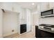 Updated kitchen featuring white cabinets, granite countertops, and stainless steel appliances at 4669 Winfield Dr, Las Vegas, NV 89147
