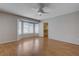 Bedroom features wood floor and bay window with blinds at 472 Staghorn Pass Ave, Las Vegas, NV 89183