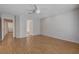 Spacious bedroom featuring hardwood floors and ceiling fan at 472 Staghorn Pass Ave, Las Vegas, NV 89183