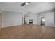 Open living space with hardwood floors and a modern fireplace at 472 Staghorn Pass Ave, Las Vegas, NV 89183