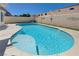 Private pool with a spa and tanning ledge. Backyard is perfect for relaxing and soaking up the sun at 472 Staghorn Pass Ave, Las Vegas, NV 89183