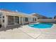 Private pool surrounded by a concrete patio and a covered patio, perfect for outdoor living at 472 Staghorn Pass Ave, Las Vegas, NV 89183
