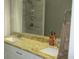 Bathroom featuring double sinks, granite countertops, and tiled shower at 4821 Black Bear Rd # 104, Las Vegas, NV 89149
