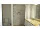 Bathroom featuring single sink, granite countertops, and tiled shower at 4821 Black Bear Rd # 104, Las Vegas, NV 89149