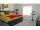 Bright bedroom with a large window and colorful decor at 4821 Black Bear Rd # 104, Las Vegas, NV 89149