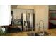 Modern kitchen with granite countertops and stainless steel appliances at 4821 Black Bear Rd # 104, Las Vegas, NV 89149