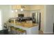 Modern kitchen with granite countertops, stainless steel appliances, and ample cabinet space at 4821 Black Bear Rd # 104, Las Vegas, NV 89149