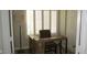 Home office featuring a desk and chair with a window with plantation shutters at 4821 Black Bear Rd # 104, Las Vegas, NV 89149