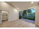 Bright bedroom with a sliding glass door that provides beautiful outdoor views at 5010 Crooked Stick Way, Las Vegas, NV 89113