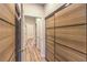 Hallway with wood floors and doors at 5010 Crooked Stick Way, Las Vegas, NV 89113
