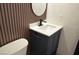 Updated bathroom featuring modern fixtures and a stylish vanity at 5086 Mountain Vista St, Las Vegas, NV 89120