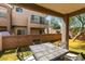Backyard with an outdoor patio seating area, perfect for entertaining at 5509 Ante Up Ct # 102, Las Vegas, NV 89122