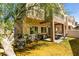 A cozy covered patio and backyard space, ideal for outdoor dining and leisure, is conveniently located off of the home at 5509 Ante Up Ct # 102, Las Vegas, NV 89122