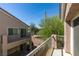 Exterior view from a balcony overlooking the yard and surrounding homes at 5509 Ante Up Ct # 102, Las Vegas, NV 89122