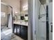 Contemporary bathroom featuring a shower, vanity, and modern fixtures at 5509 Ante Up Ct # 102, Las Vegas, NV 89122
