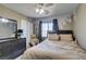 Cozy bedroom with a plush bed, closet, and dresser, perfect for relaxing at 5509 Ante Up Ct # 102, Las Vegas, NV 89122