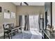Bonus room with open sliding glass door to a balcony and neutral decor at 5509 Ante Up Ct # 102, Las Vegas, NV 89122