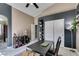 Bonus room with a desk, shelving unit, ensuite door and closet at 5509 Ante Up Ct # 102, Las Vegas, NV 89122