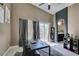 Bonus room with seating, balcony access, and an ensuite bathroom at 5509 Ante Up Ct # 102, Las Vegas, NV 89122
